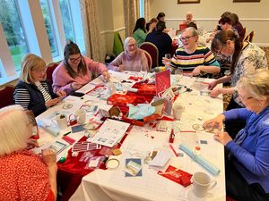 A group of people gathered who are learning card making, meeting people and sharing ideas in the local Skipton area.